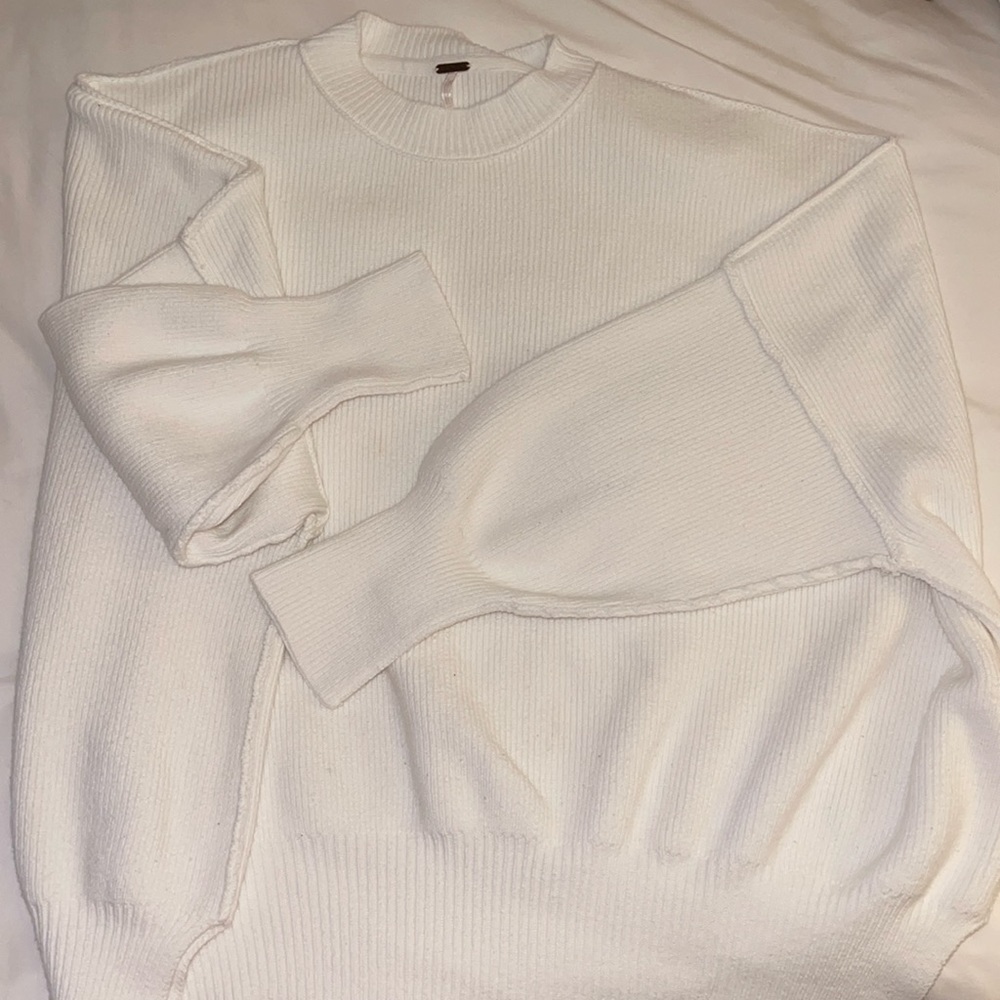 Free People white sweater size Medium.